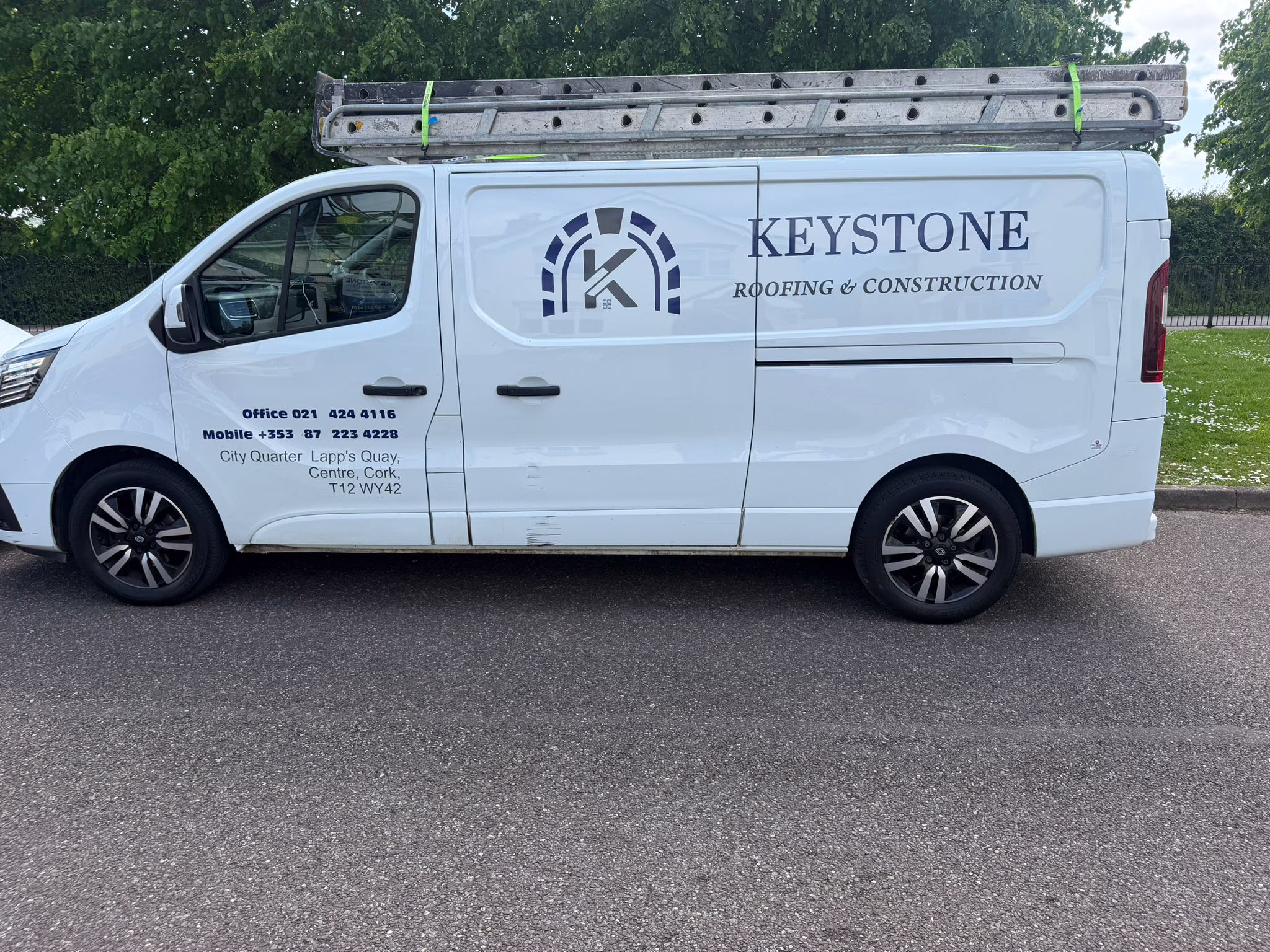 Keystone Roofing Cork van with roof ladders ready for a residential job